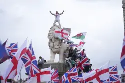 Thousands march in London in support of far-right activist Tommy Robinson